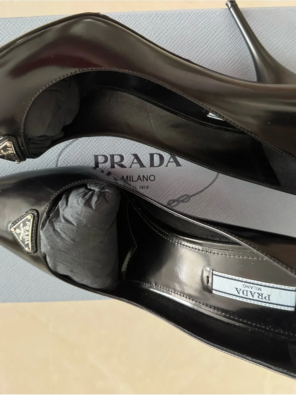 Prada Black Patent Pointed-Toe Pumps with Triangle Logo